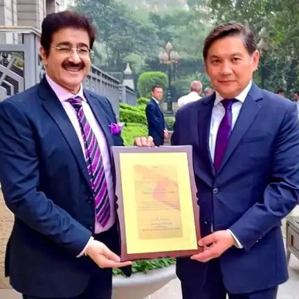 ICMEI Presented Token of Love to Asein Isaev of Kyrgyz Republic